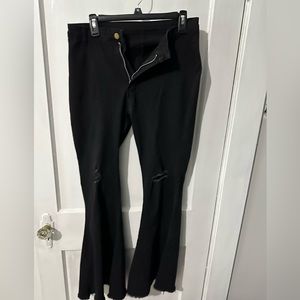 Black ripped bell bottoms